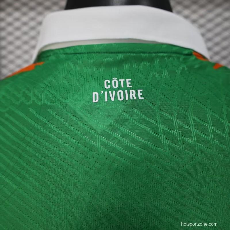 Player Version 2025 Ivory Coast Green with Elephant Graphic and Orange Trim Jersey