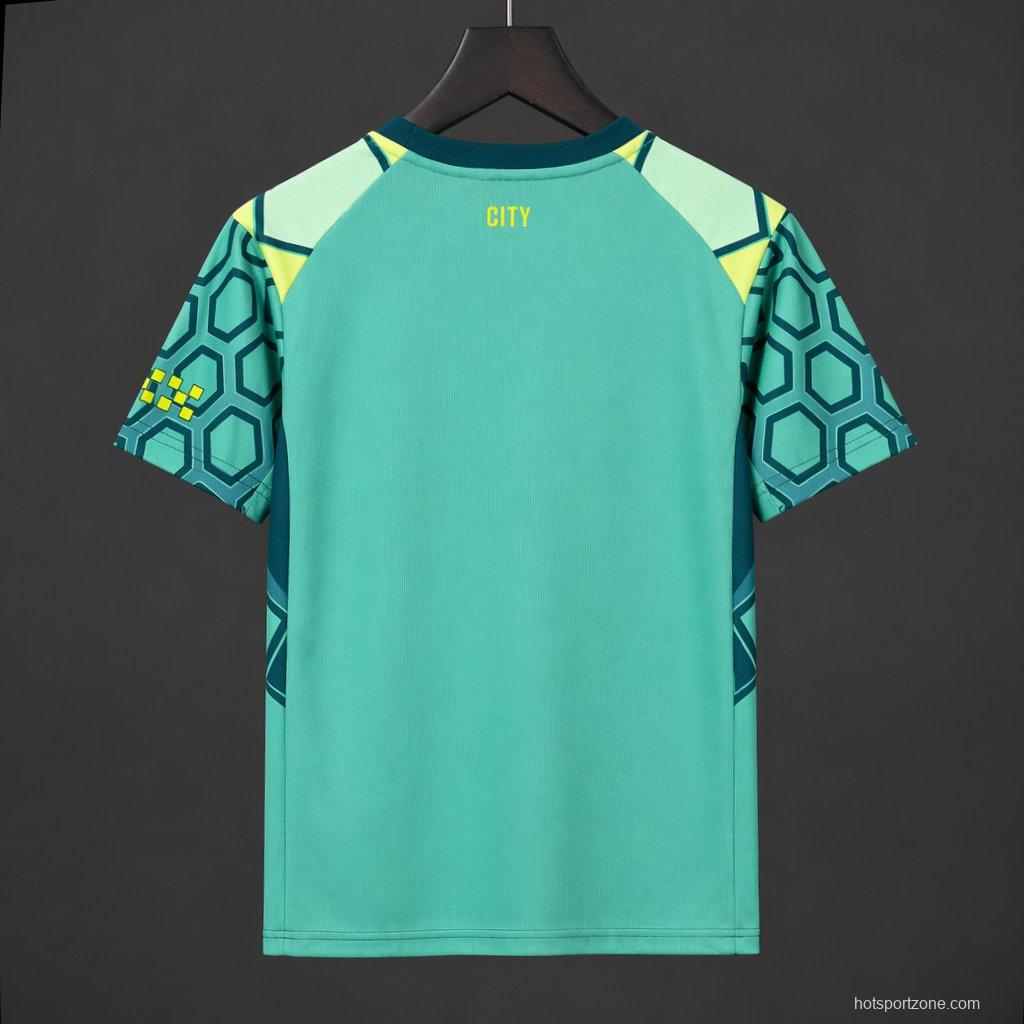 26/27 Manchester City Vibrant Green Goalkeeper Jersey With Dark Blue Geometric Pattern.